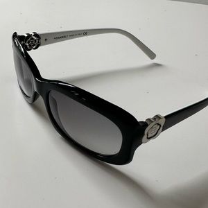 Chanel Camellia flower sunglasses in black and white